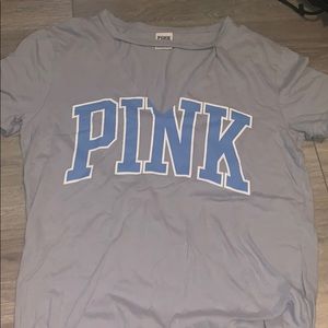 Pink shirt with a V cut out